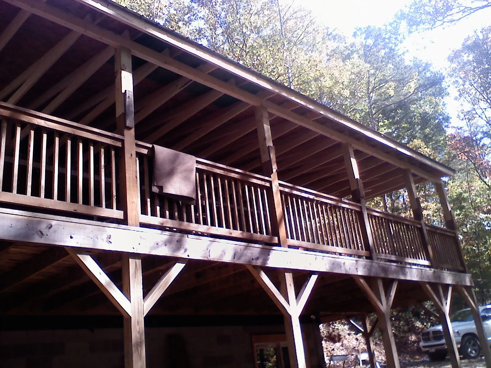 Timber framing under a new elevated porch and deck — Roof Leak Repair in Enigma by Roofing Brothers